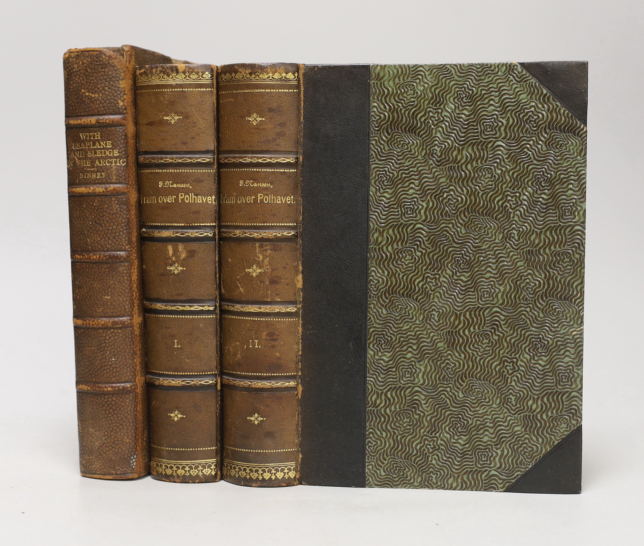 Nansen, Fridtjof - Fram over Polhavet: den Norske Polarfaerd 1893-1896. 2 vols. photogravure portrait, 42 plates (3 coloured and folded) and 3 coloured and folded maps; contemp. half morocco and cloth, patterned e/ps. Kr